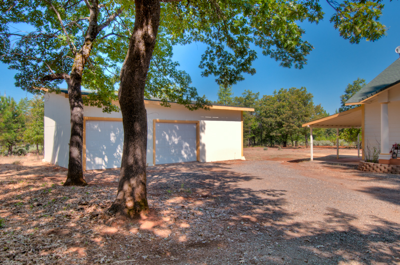 10672 Ridgetop Road Whitmore, CA 96096 - Photo 2 of 20 a view of a house with a tree