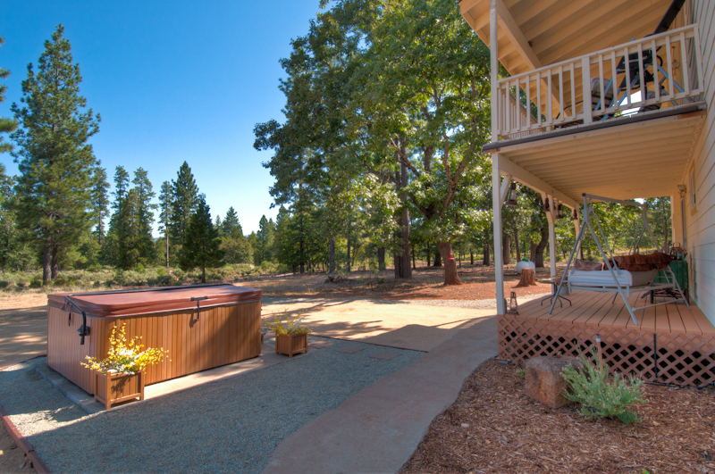 10672 Ridgetop Road Whitmore, CA 96096 - Photo 4 of 20 a view of a house with backyard and sitting area