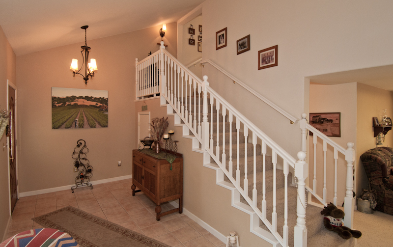 10672 Ridgetop Road Whitmore, CA 96096 - Photo 7 of 20 a view of a livingroom with wooden floor and stairs