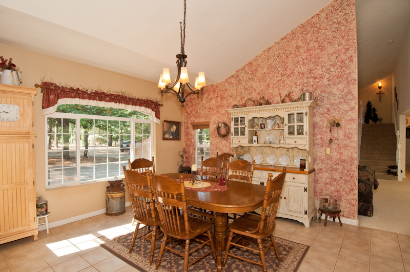 10672 Ridgetop Road Whitmore, CA 96096 - Photo 10 of 20 a view of a dining room with furniture and chandelier