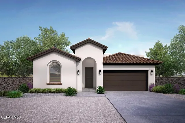 a front view of a house with a garden and garage