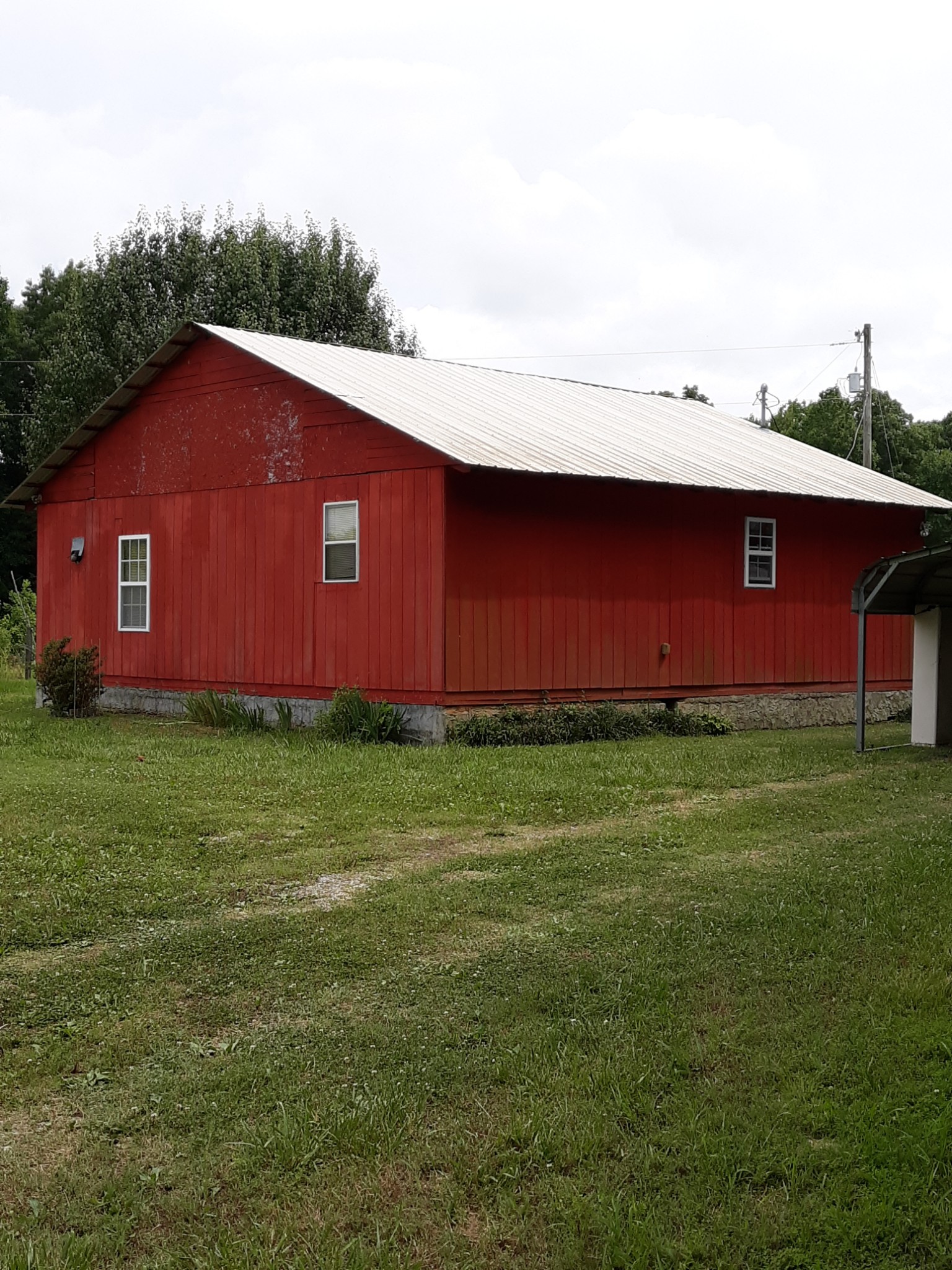 151 Abernathy Road Pulaski, TN 38478 - Photo 1 of 11 a backyard of a house with lots of green space