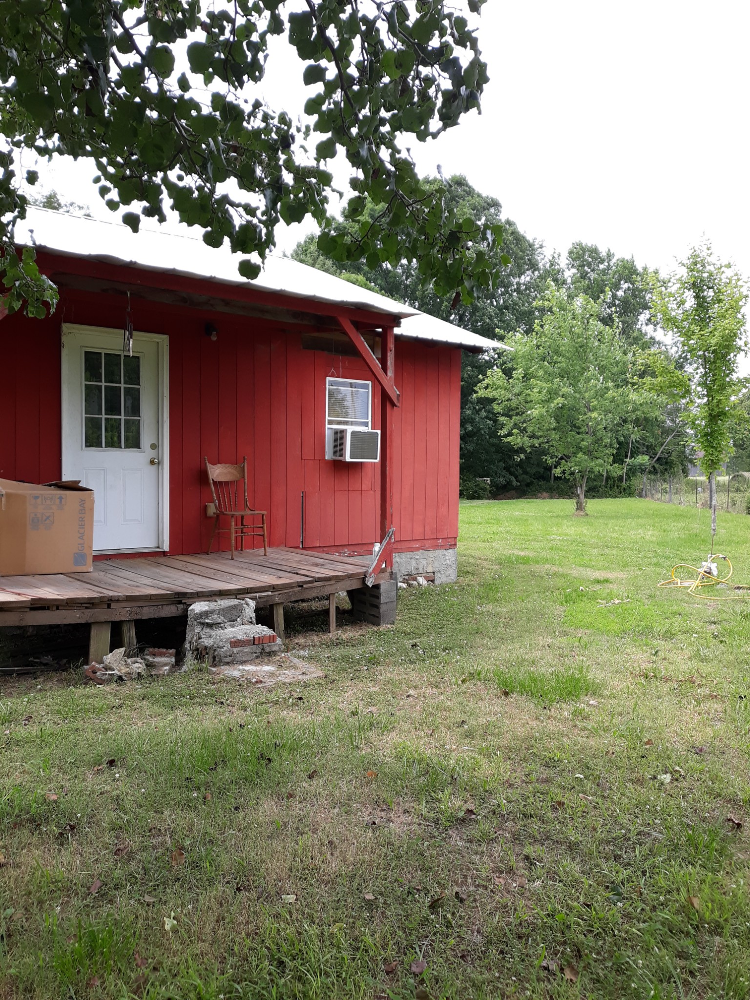 151 Abernathy Road Pulaski, TN 38478 - Photo 3 of 11 a backyard of a house with table and chairs