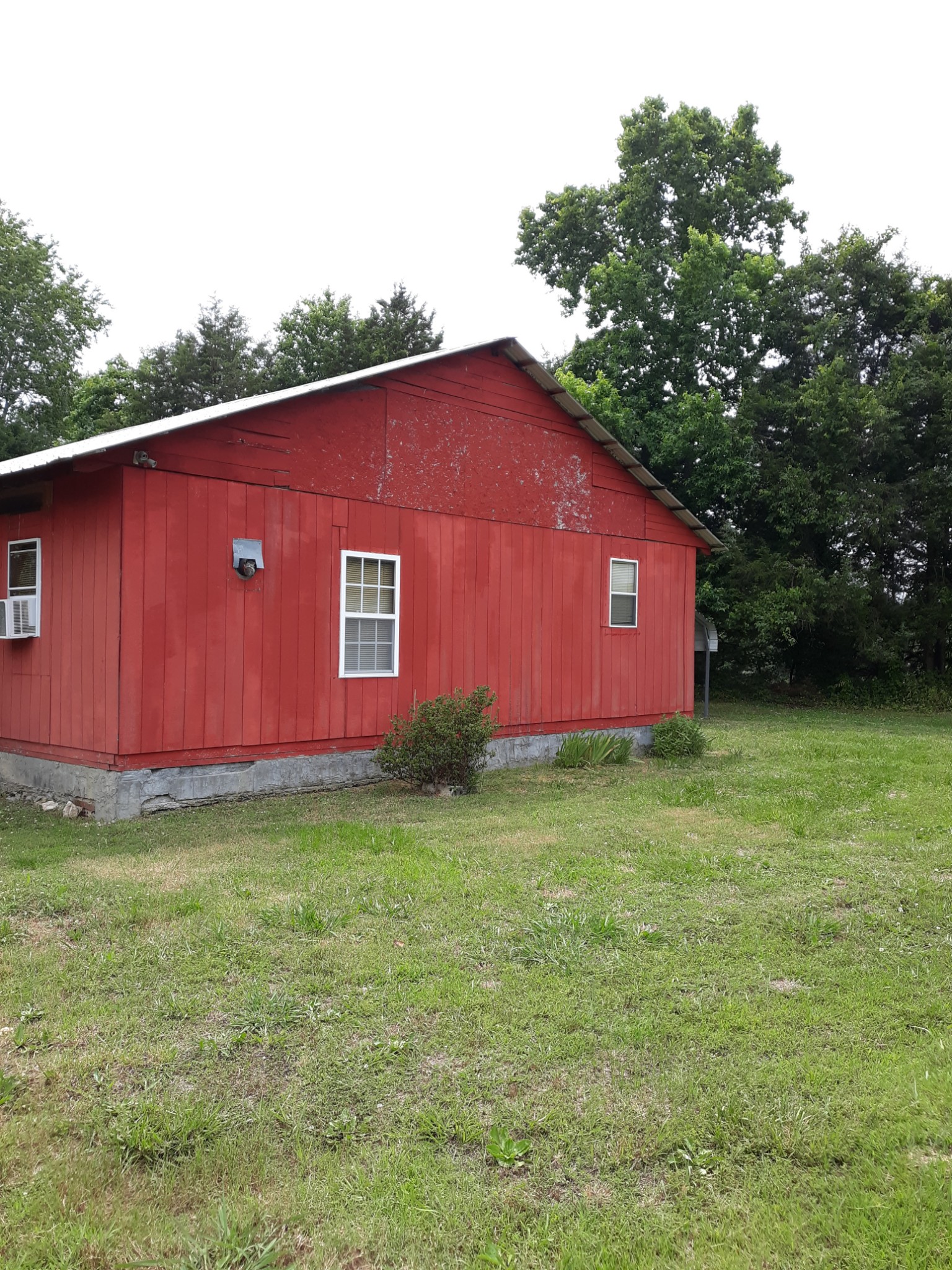 151 Abernathy Road Pulaski, TN 38478 - Photo 4 of 11 a view of a backyard with a garden