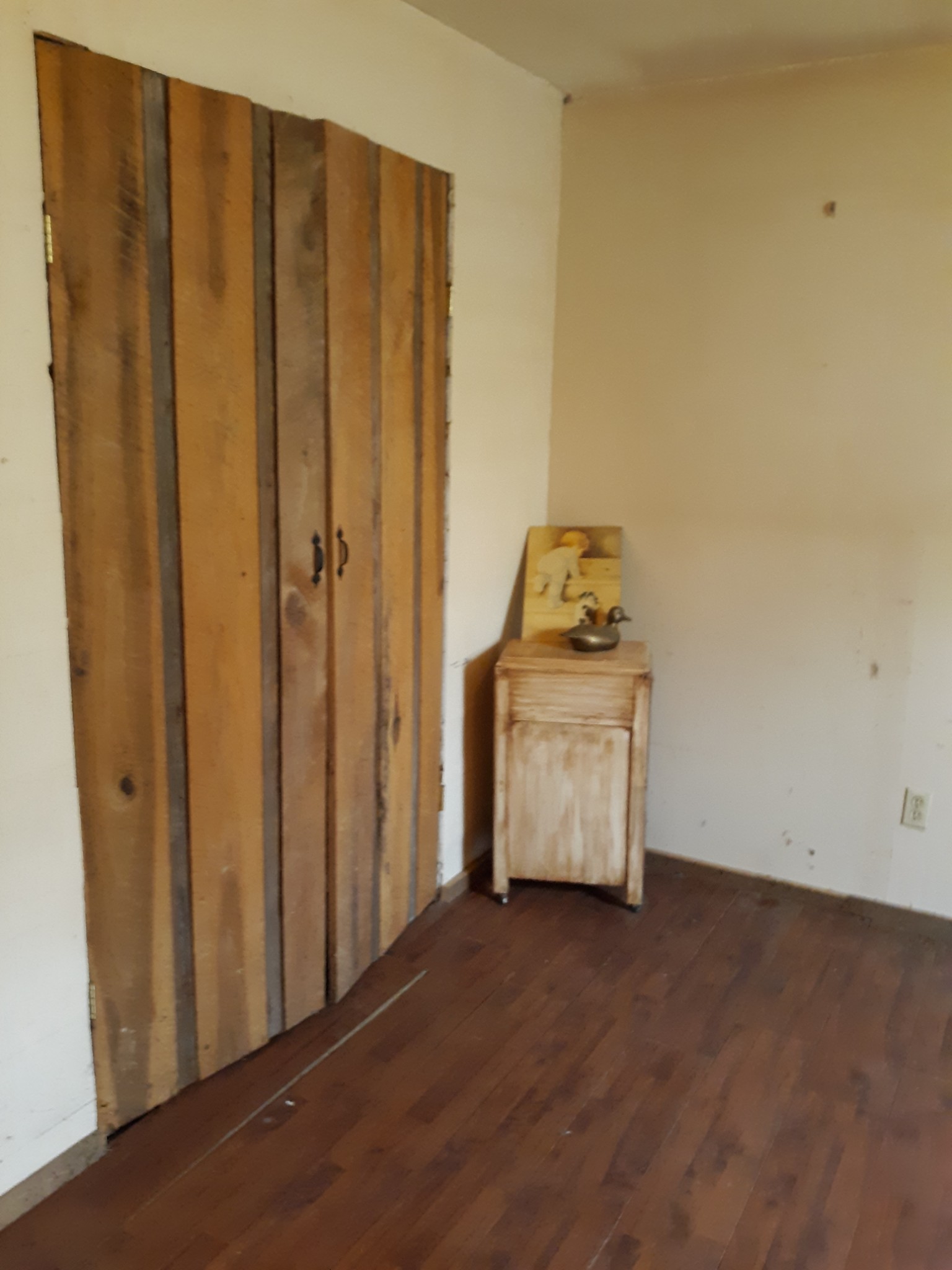 151 Abernathy Road Pulaski, TN 38478 - Photo 7 of 11 a room with a stove and a wooden door