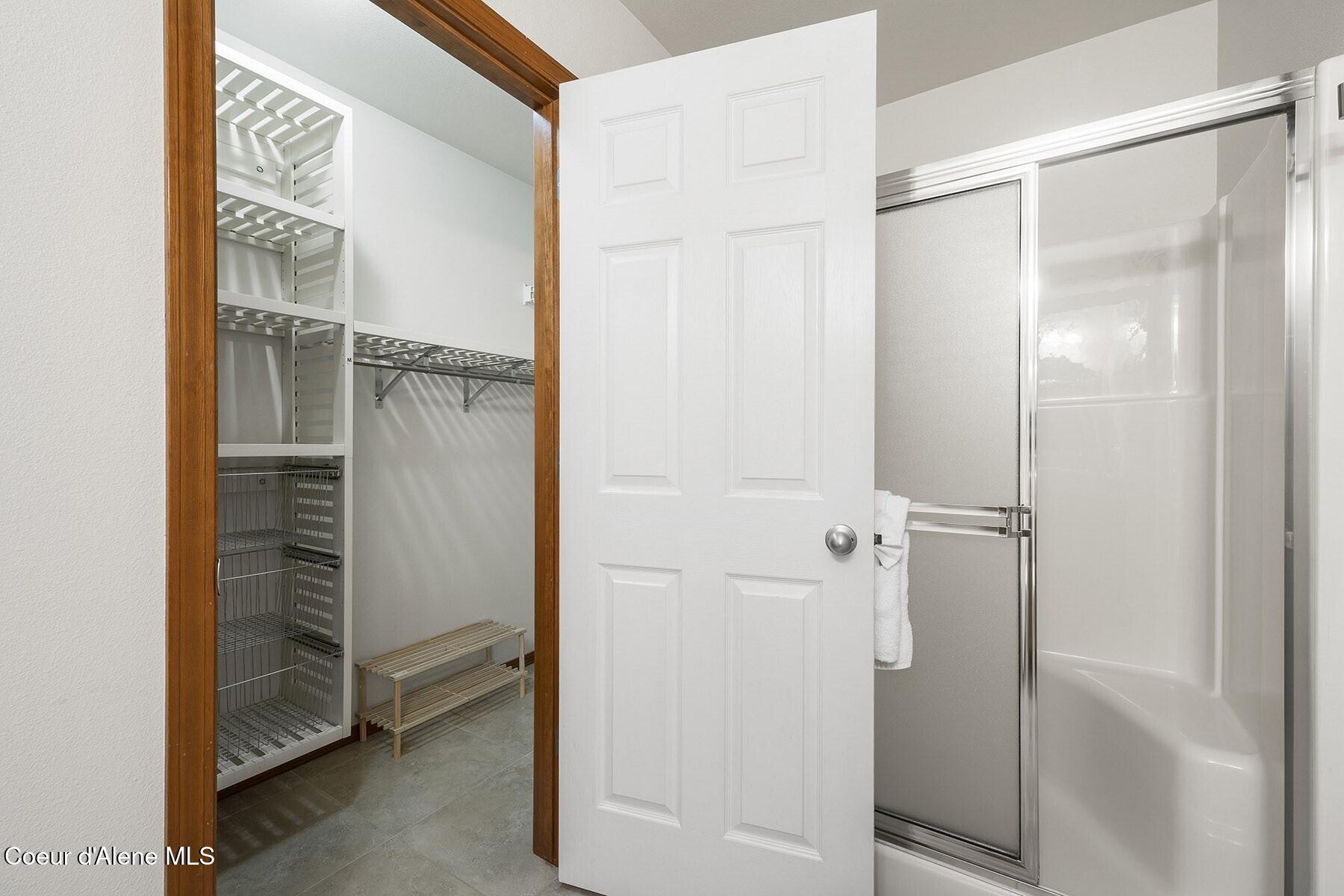 19820 South Alcan Road Coeur D'Alene, ID 83814 - Photo 26 of 81 Walk-In Closet with Glass Shower