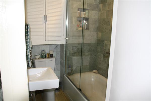 14 Clark Road Ipswich, MA 01938 - Photo 12 of 12 a bathroom with a sink a toilet and shower
