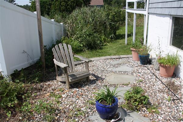 14 Clark Road Ipswich, MA 01938 - Photo 5 of 12 a garden with trees in front of it