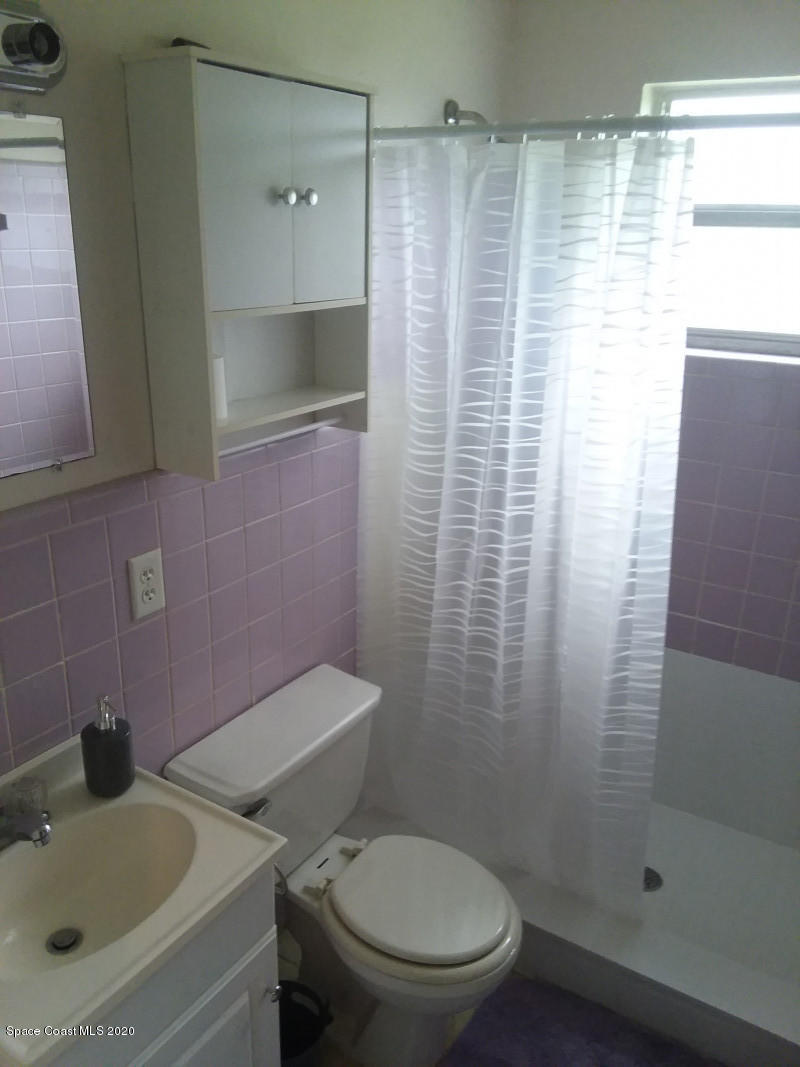 1030 Hibiscus Street Cocoa, FL 32927 - Photo 5 of 6 a bathroom with a sink and toilet