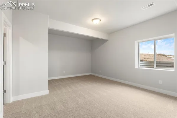 an empty room with a window