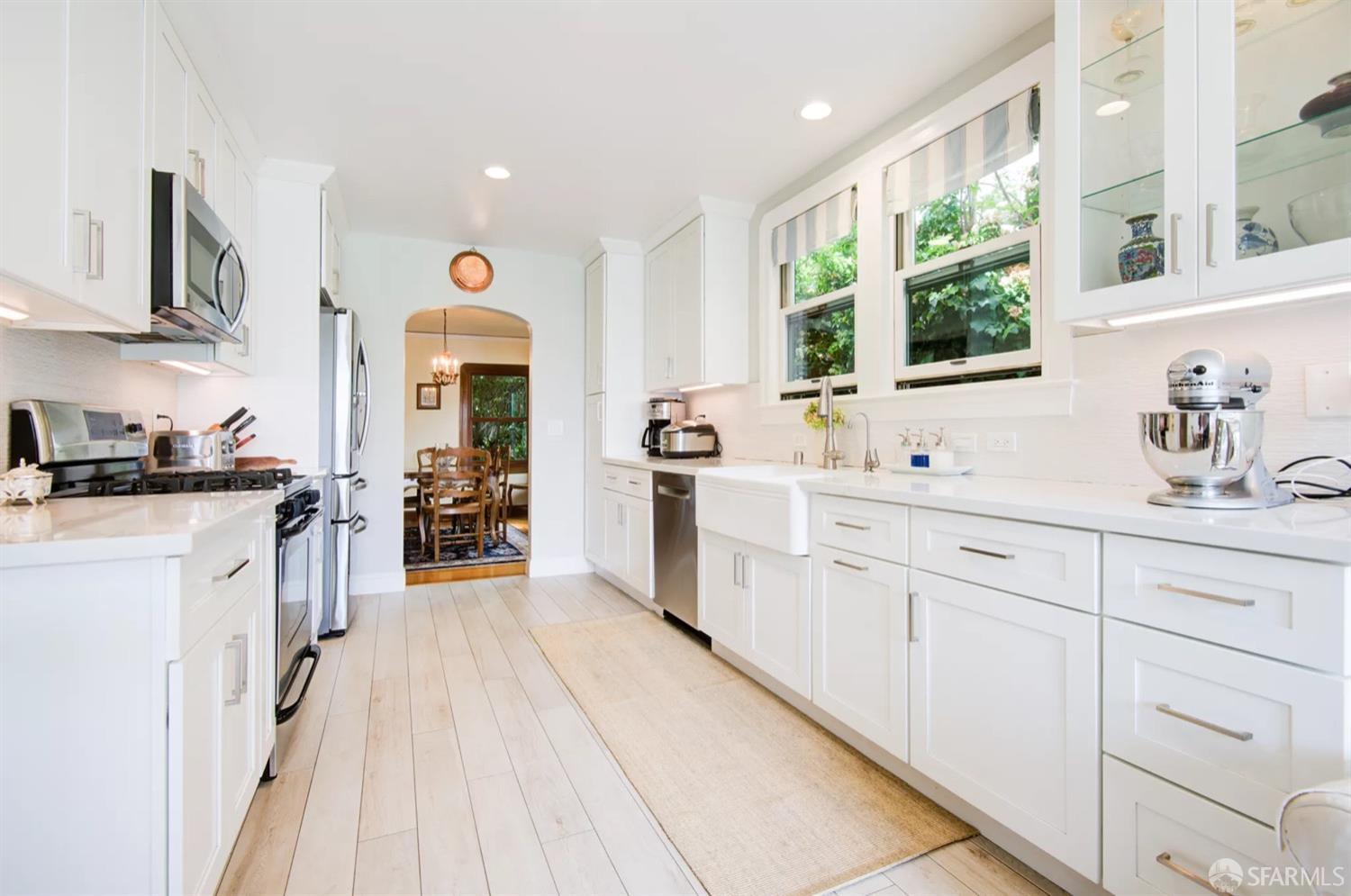 3231 Fernside Boulevard Alameda, CA 94501 - Photo 11 of 38 a kitchen with cabinets a sink and appliances