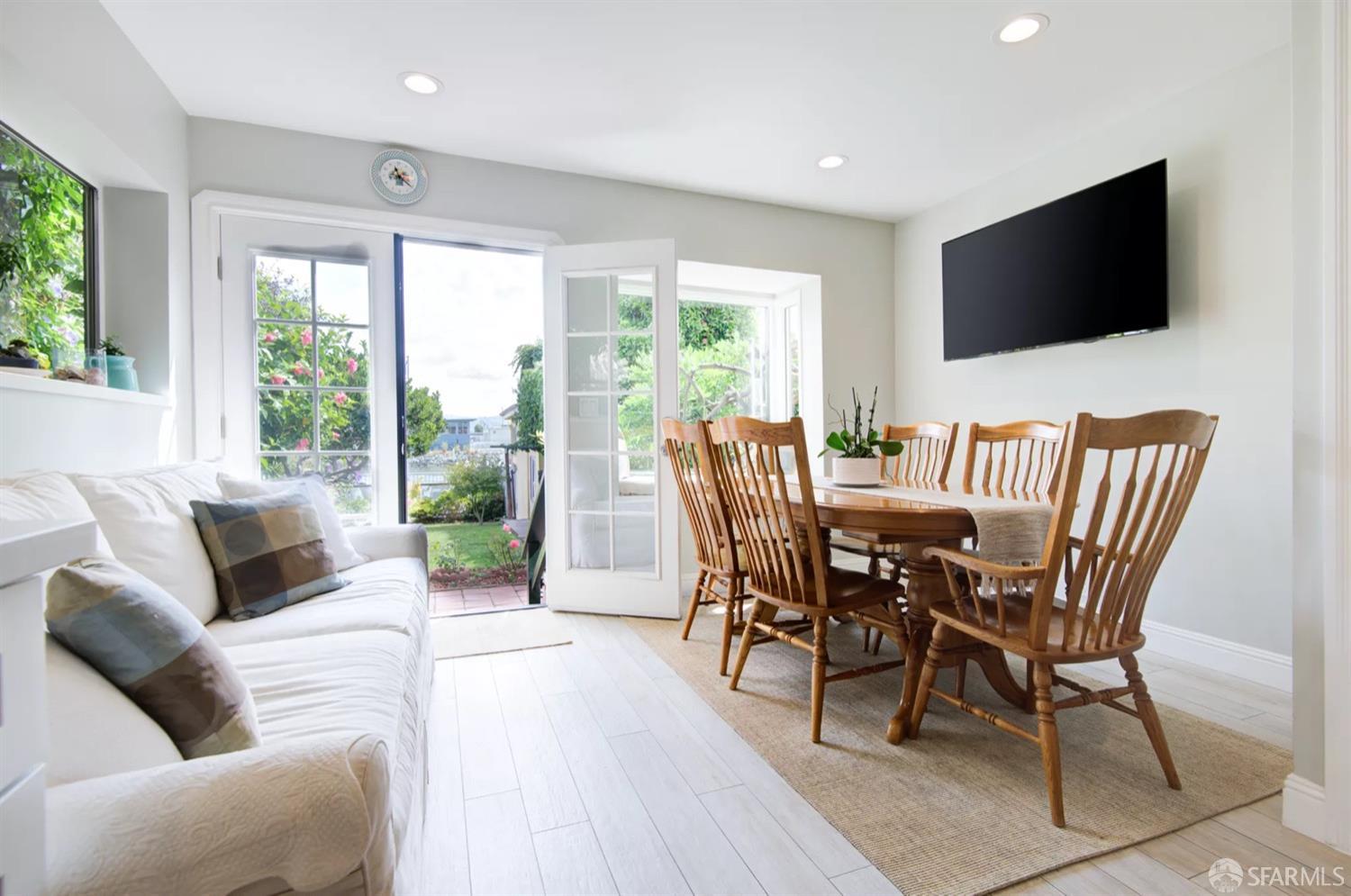 3231 Fernside Boulevard Alameda, CA 94501 - Photo 13 of 38 a view of a livingroom with furniture and a flat screen tv