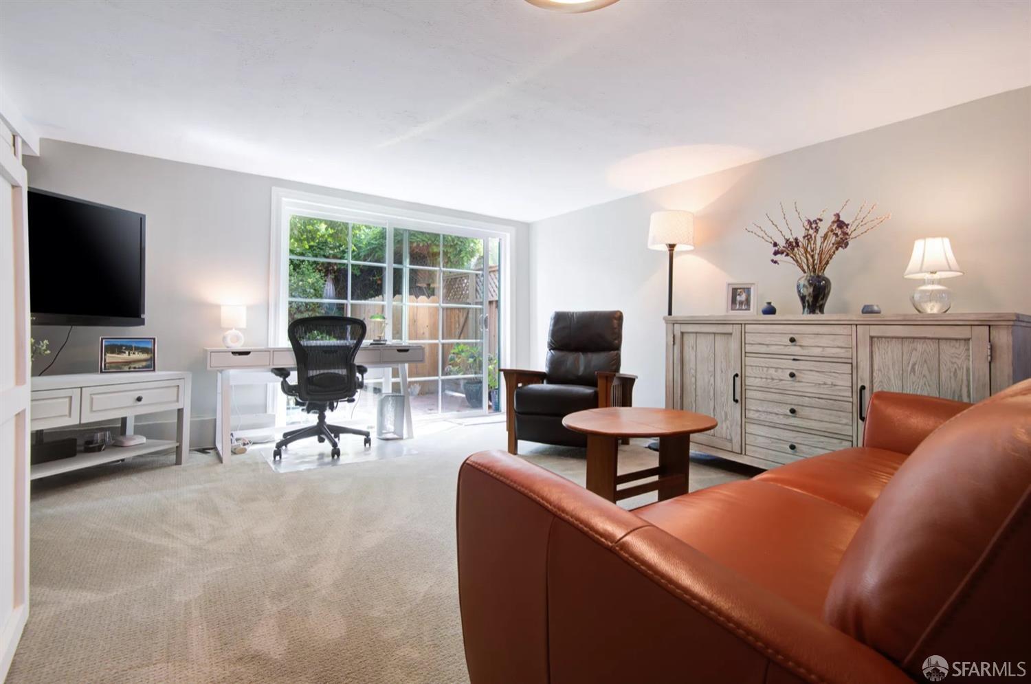 3231 Fernside Boulevard Alameda, CA 94501 - Photo 24 of 38 a living room with furniture and a flat screen tv