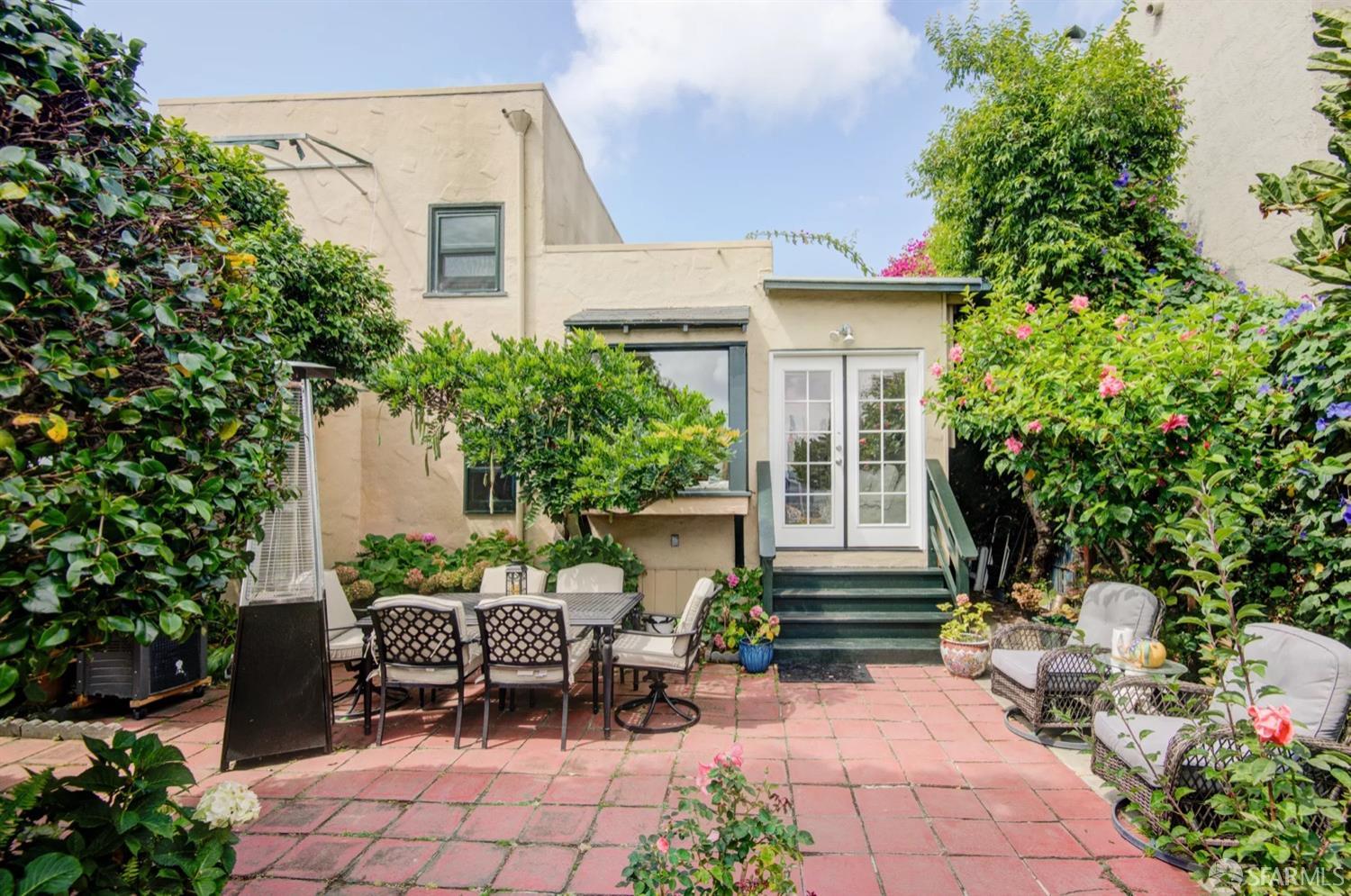 3231 Fernside Boulevard Alameda, CA 94501 - Photo 29 of 38 a view of a house with backyard sitting area and garden