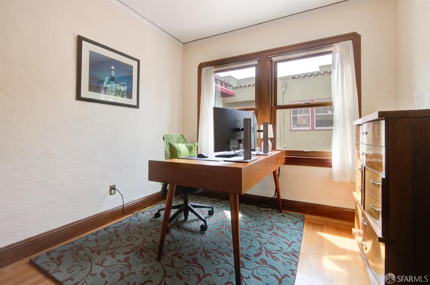 3231 Fernside Boulevard Alameda, CA 94501 - Photo 10 of 38 a room with furniture and a window