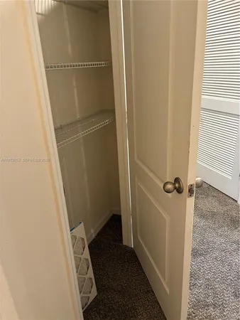 an empty room with an empty room