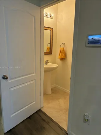 an empty room with an entrance door