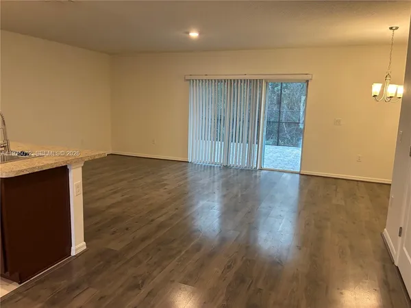 a view of a big room with a balcony