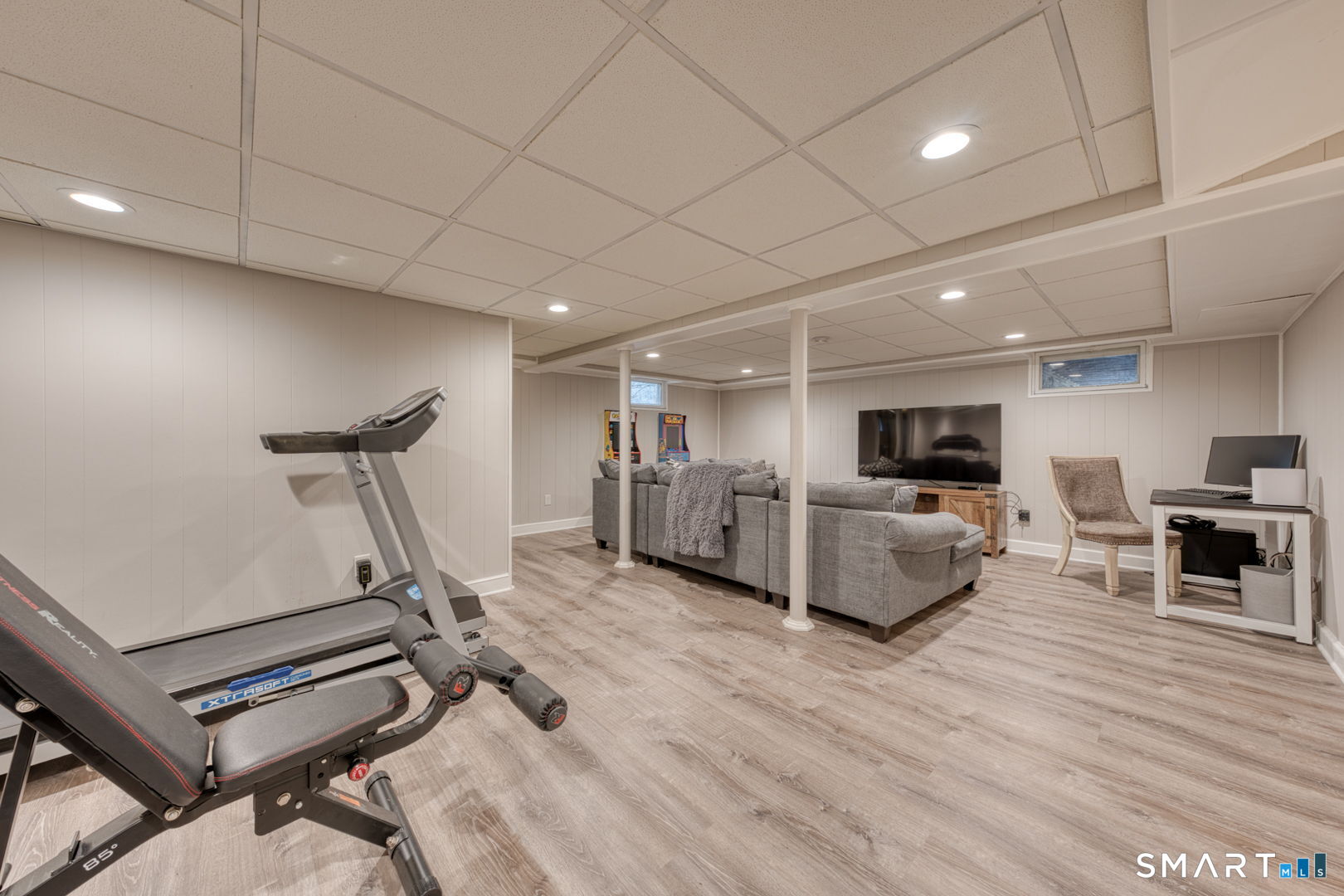 155 Spring Street Glastonbury, CT 06033 - Photo 25 of 35 Finished lower level! Ideal for working out + relaxing!