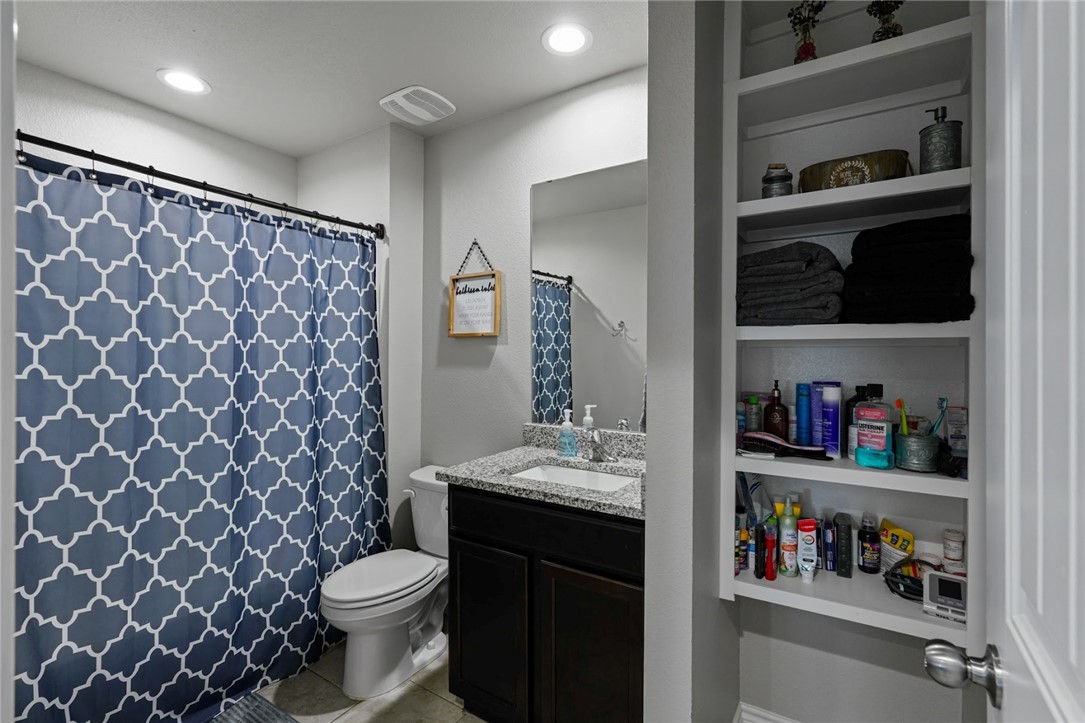 7618 Herd Rider Corpus Christi, TX 78414 - Photo 12 of 14 a bathroom with a sink and a toilet