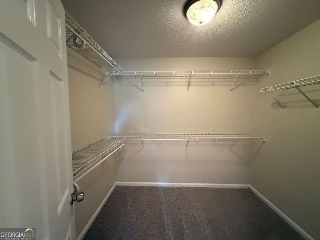 3749 Old Pine Road Valdosta, GA 31605 - Photo 12 of 24 a view of a room with racks on the wall