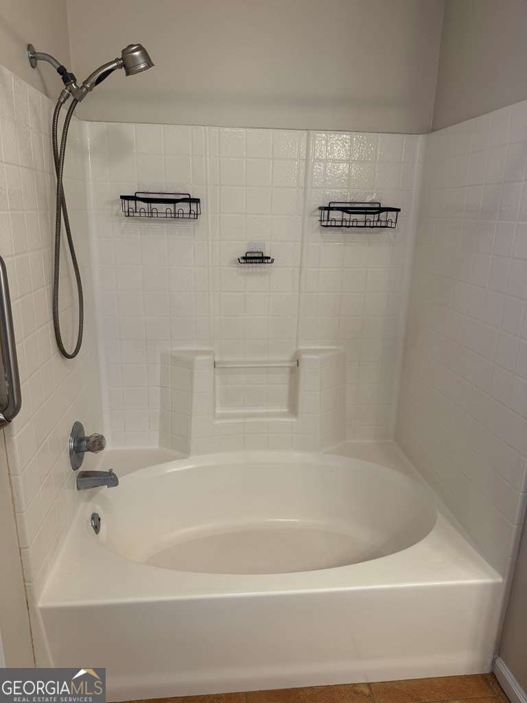 3749 Old Pine Road Valdosta, GA 31605 - Photo 15 of 24 a bathroom with a bath tub with a shower
