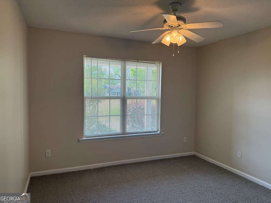 3749 Old Pine Road Valdosta, GA 31605 - Photo 16 of 24 an empty room with a window