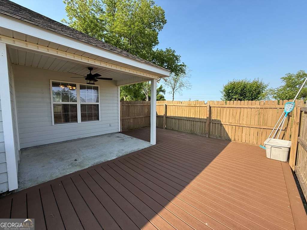 3749 Old Pine Road Valdosta, GA 31605 - Photo 21 of 24 a balcony with wooden floor and outdoor space