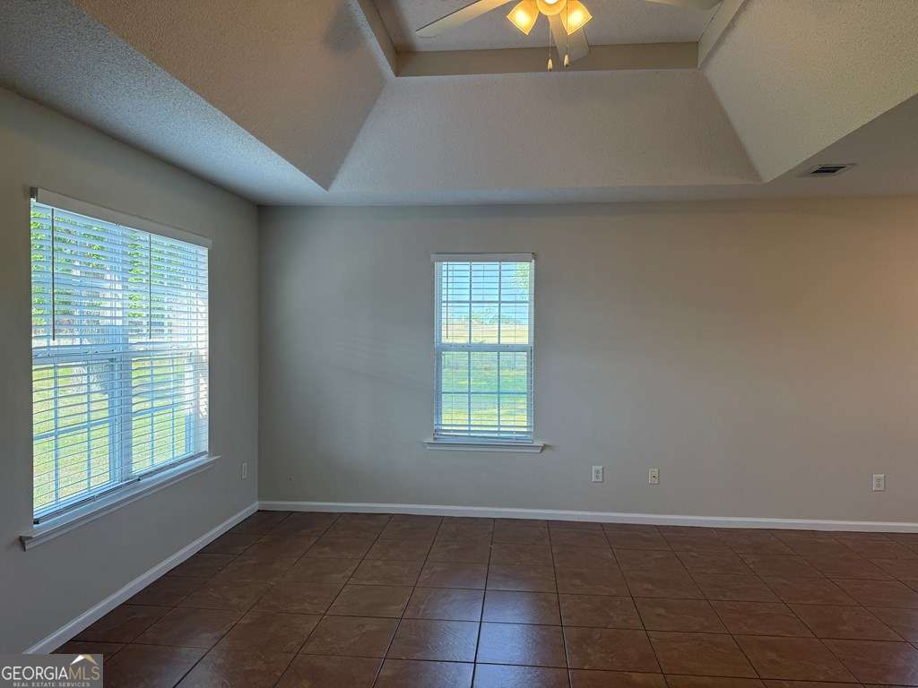3749 Old Pine Road Valdosta, GA 31605 - Photo 3 of 24 a view of an empty room with a window