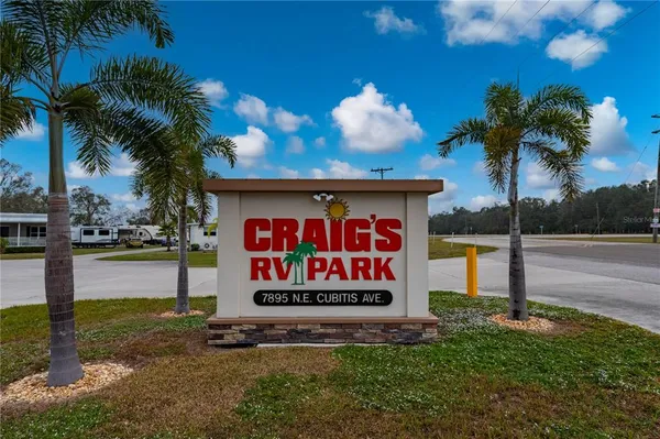 a sign on the side of the road