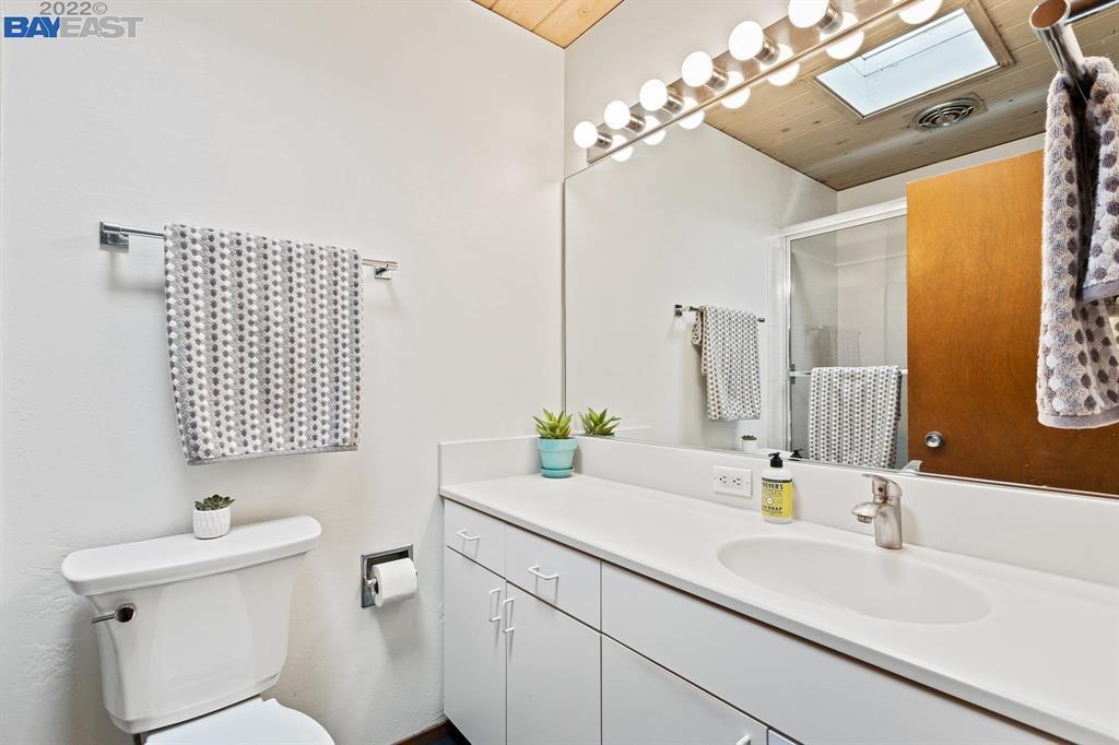 252 Clyde Drive Walnut Creek, CA 94598 - Photo 28 of 57 a bathroom with a sink a toilet and mirror
