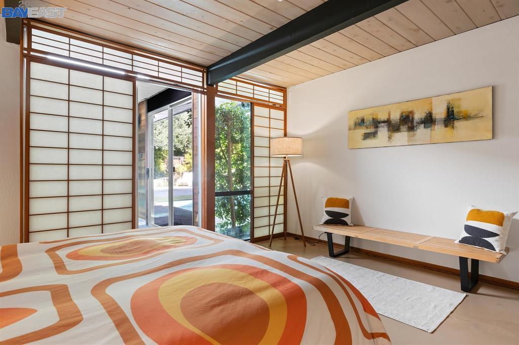 252 Clyde Drive Walnut Creek, CA 94598 - Photo 36 of 57 a bedroom with a bed and a large window