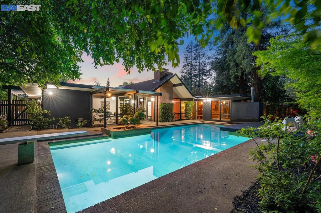 252 Clyde Drive Walnut Creek, CA 94598 - Photo 46 of 57 a view of a house with swimming pool and sitting area