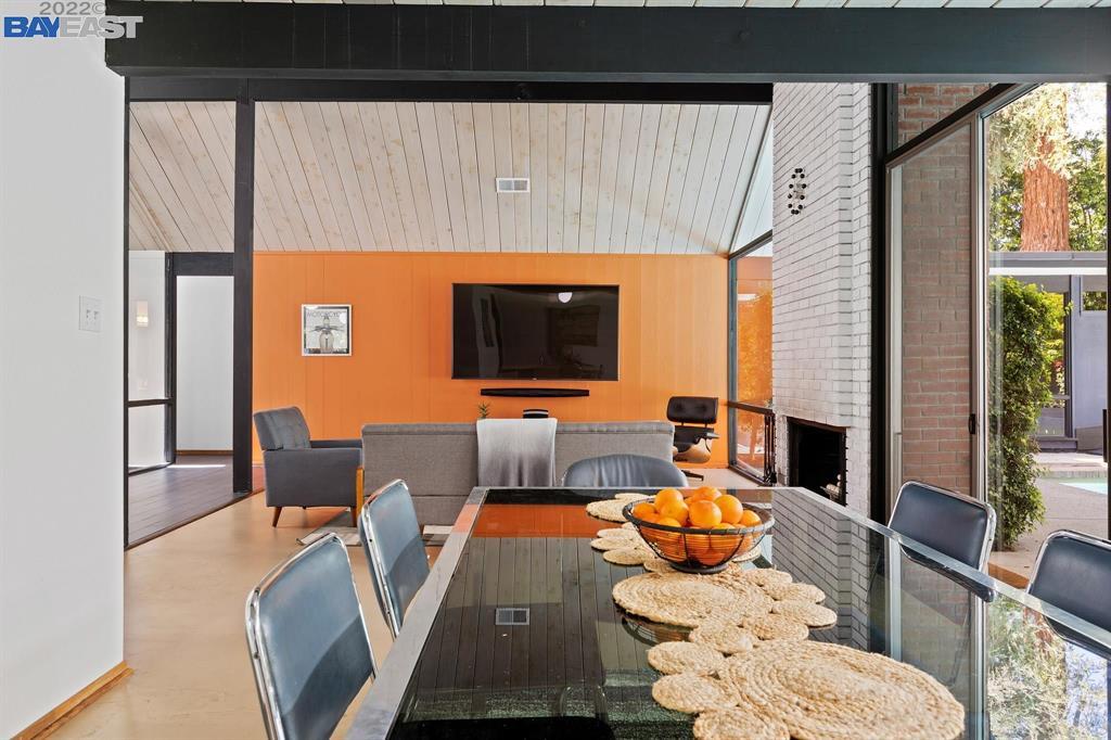 252 Clyde Drive Walnut Creek, CA 94598 - Photo 9 of 57 a living room with furniture and a flat screen tv