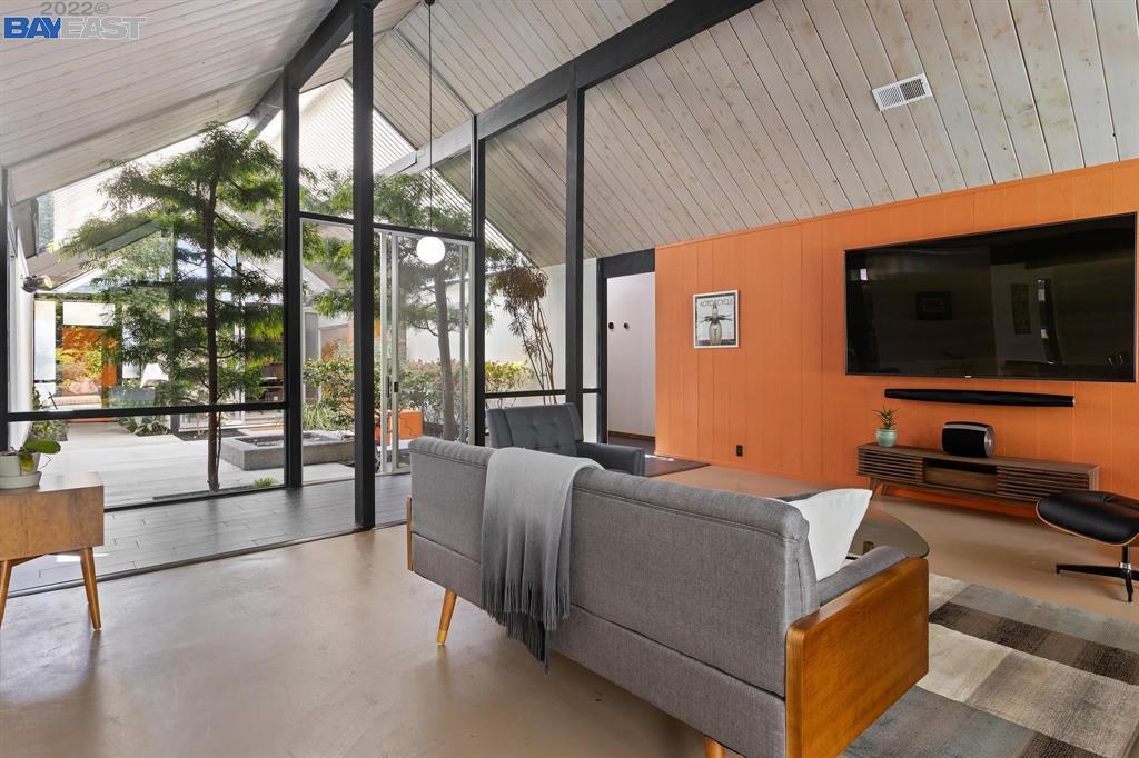 252 Clyde Drive Walnut Creek, CA 94598 - Photo 10 of 57 a room with furniture and a flat screen tv