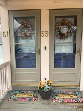a front view of a house with a door