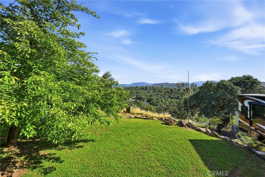 20257 Indian Rock Road Hidden Valley Lake, CA 95467 - Photo 18 of 33 Large yard with sweeping mountain views.