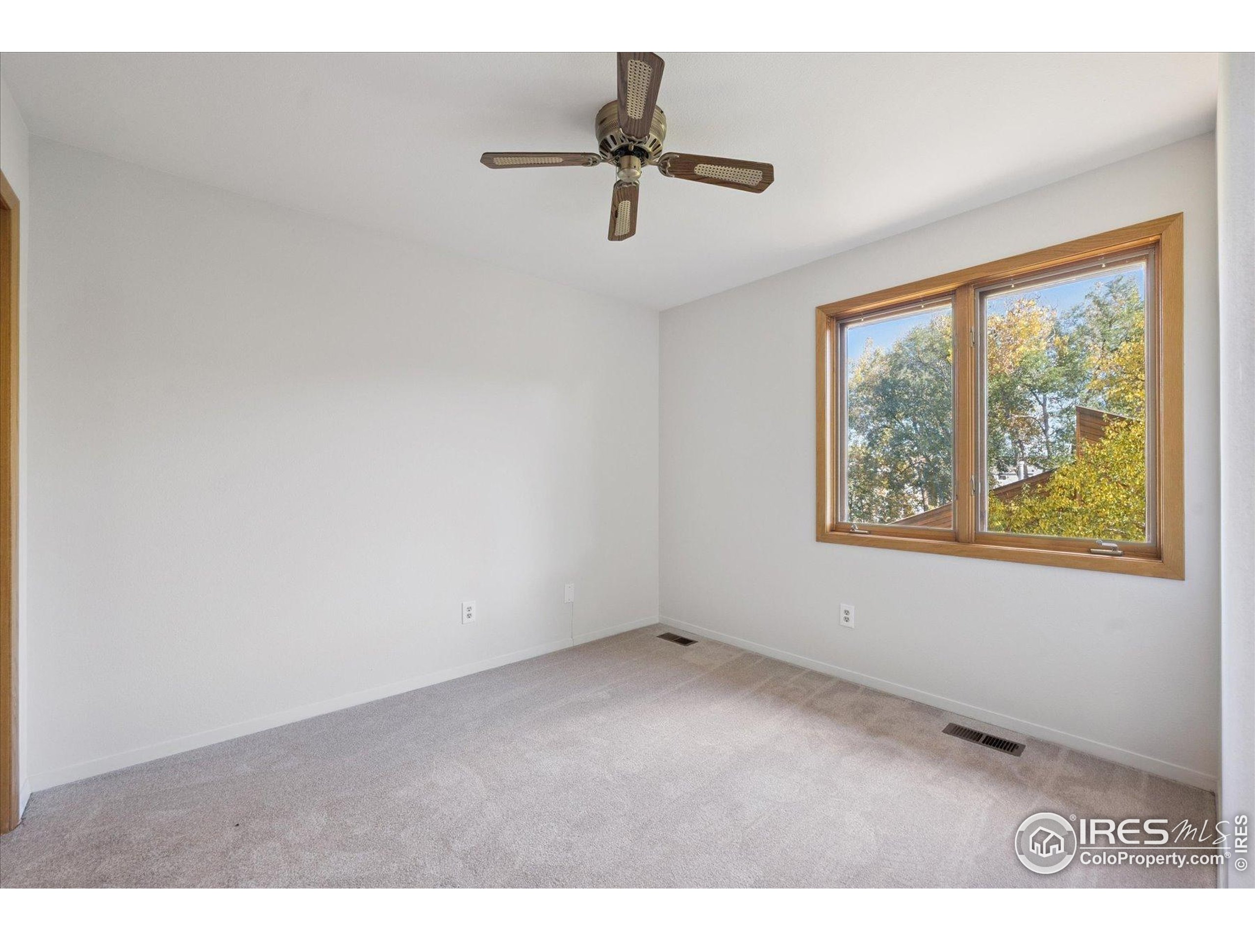 3330 34th Street Boulder, CO 80301 - Photo 21 of 32 a view of an empty room with a window