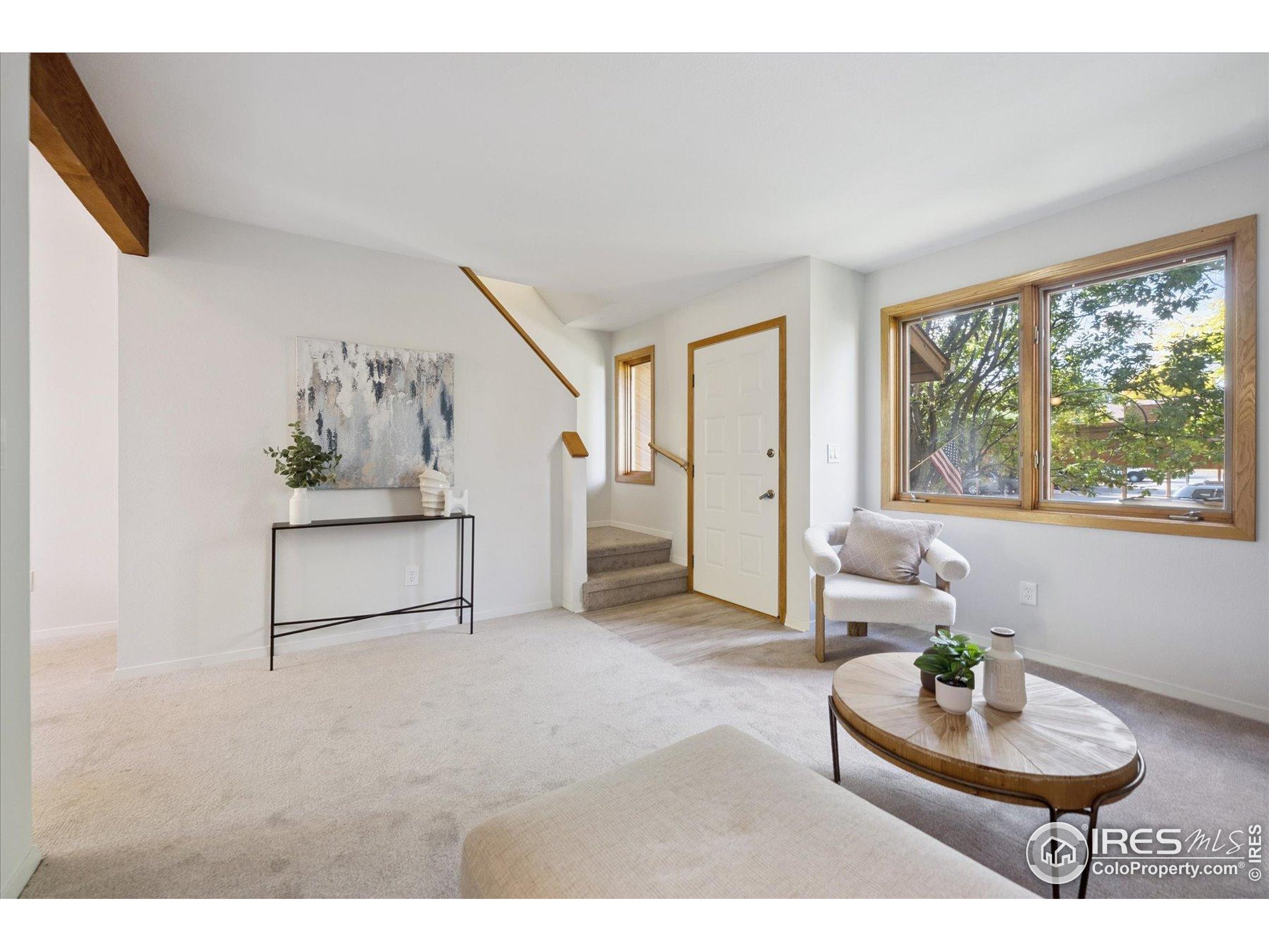 3330 34th Street Boulder, CO 80301 - Photo 5 of 32 a living room with furniture and a window