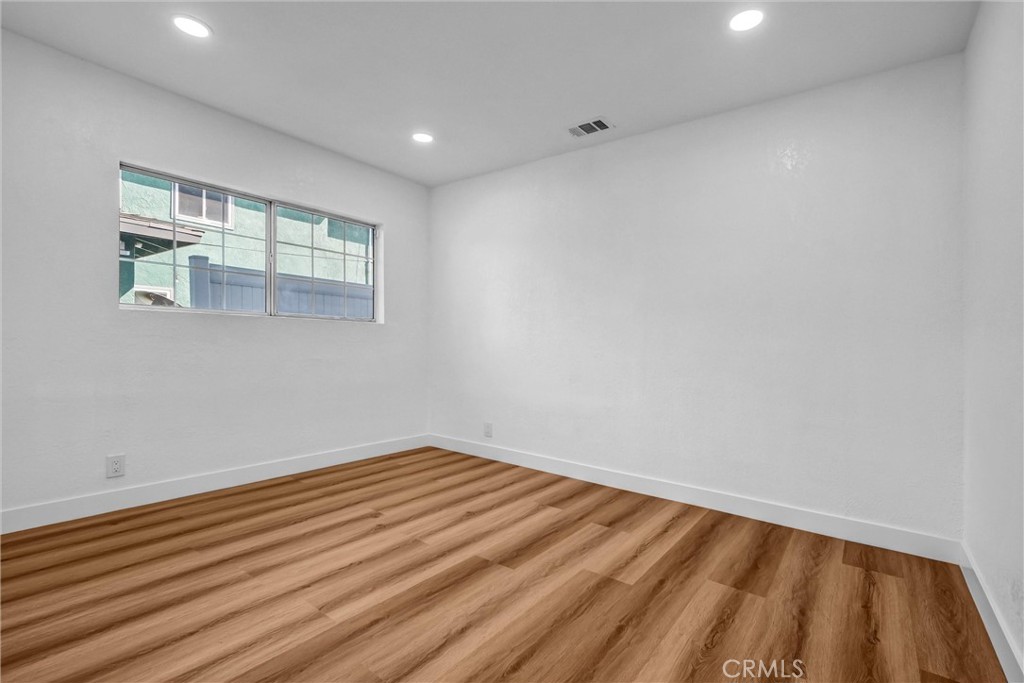 1200 South Castlegate Avenue Compton, CA 90221 - Photo 21 of 39 Second bottom floor bedroom