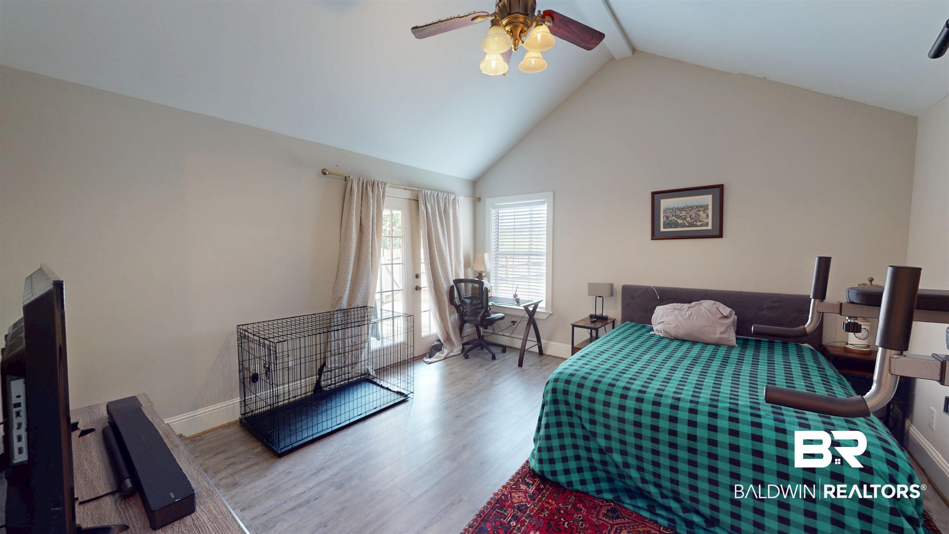 51 Bishop Lane South Mobile, AL 36608 - Photo 11 of 19 Bedroom featuring high vaulted ceiling, wood finished floors, ceiling fan, and an office area