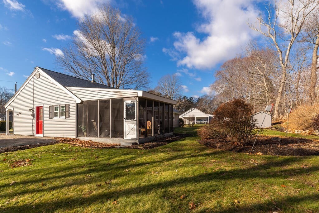 23 Walker Road Beverly, MA 01915 - Photo 2 of 33 a view of a house with a big yard and large tree