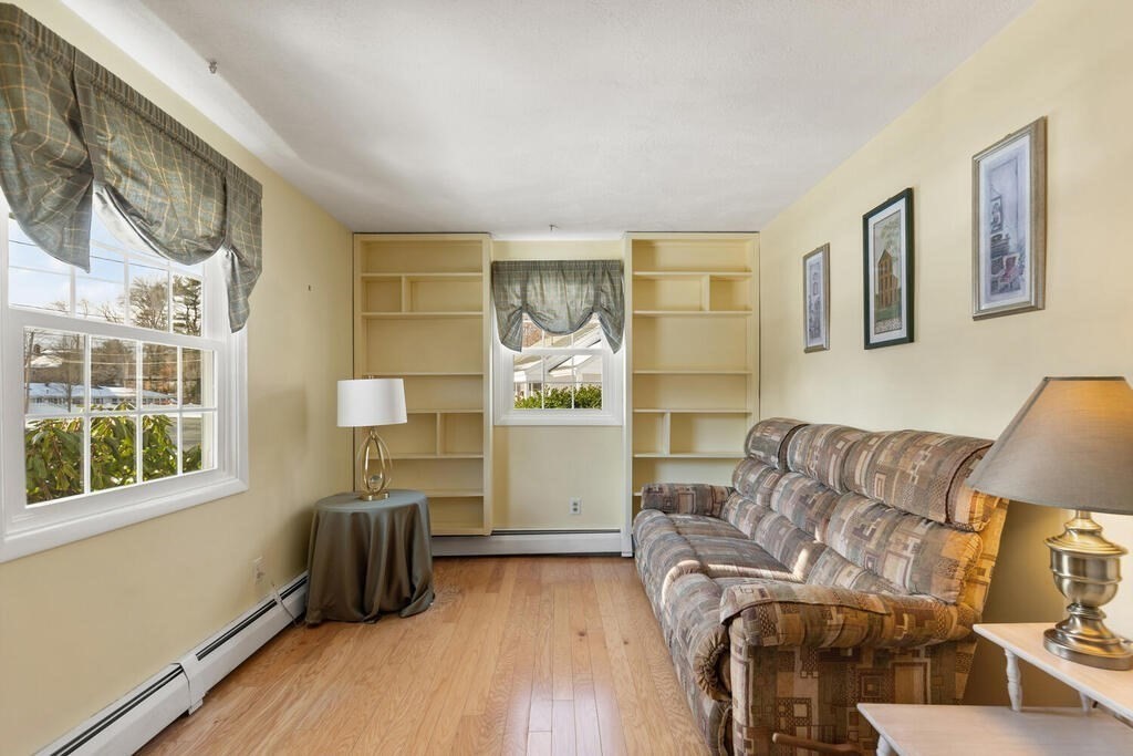 23 Walker Road Beverly, MA 01915 - Photo 27 of 33 a living room with furniture and a window