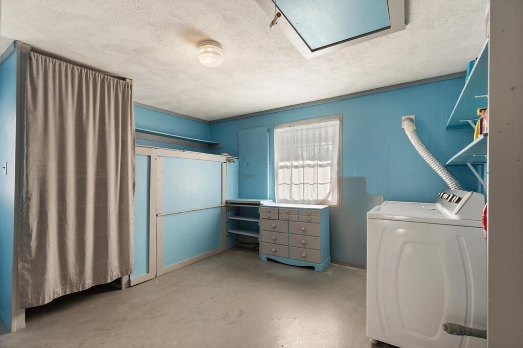 23 Walker Road Beverly, MA 01915 - Photo 29 of 33 a room with furniture and a window