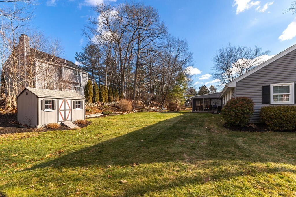 23 Walker Road Beverly, MA 01915 - Photo 3 of 33 a view of a house with a yard