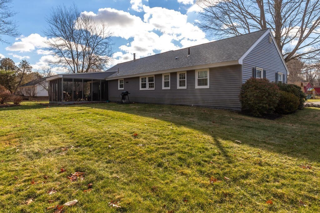 23 Walker Road Beverly, MA 01915 - Photo 4 of 33 a view of a house with a yard