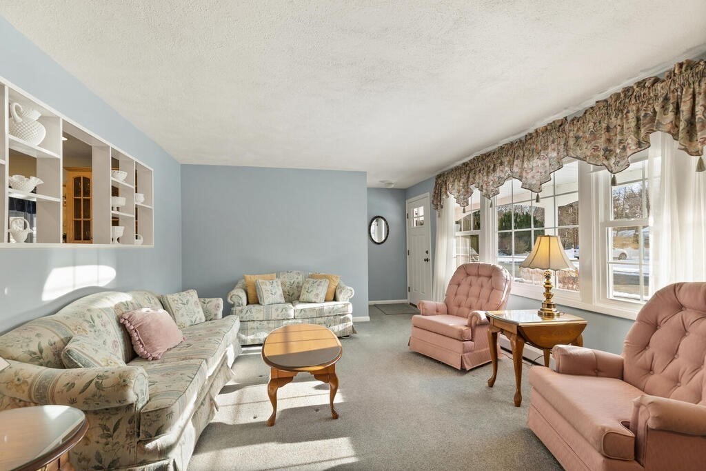 23 Walker Road Beverly, MA 01915 - Photo 6 of 33 a living room with furniture and a large window