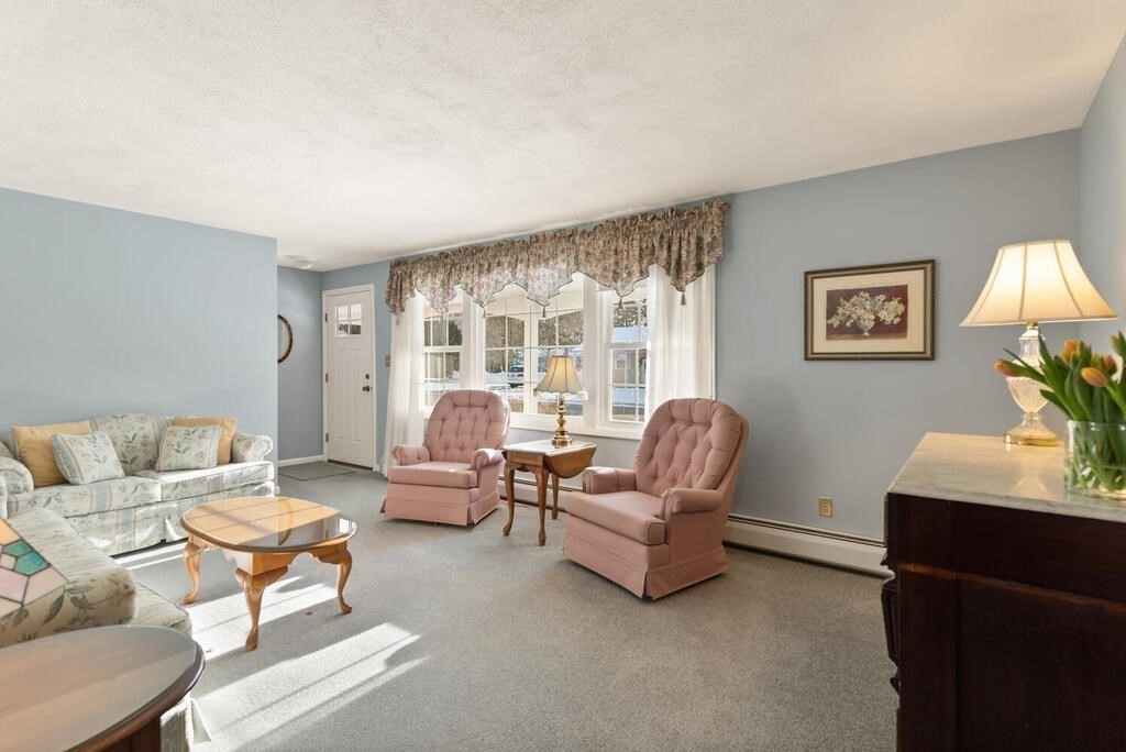 23 Walker Road Beverly, MA 01915 - Photo 8 of 33 a living room with furniture and a window