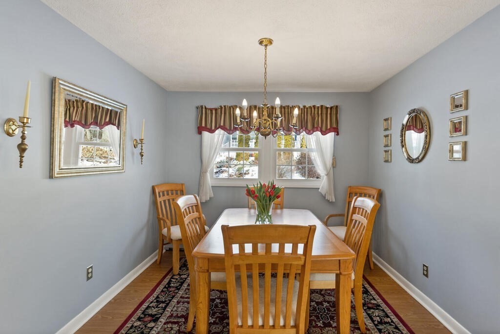 23 Walker Road Beverly, MA 01915 - Photo 10 of 33 a view of a dining room with furniture window and outside view