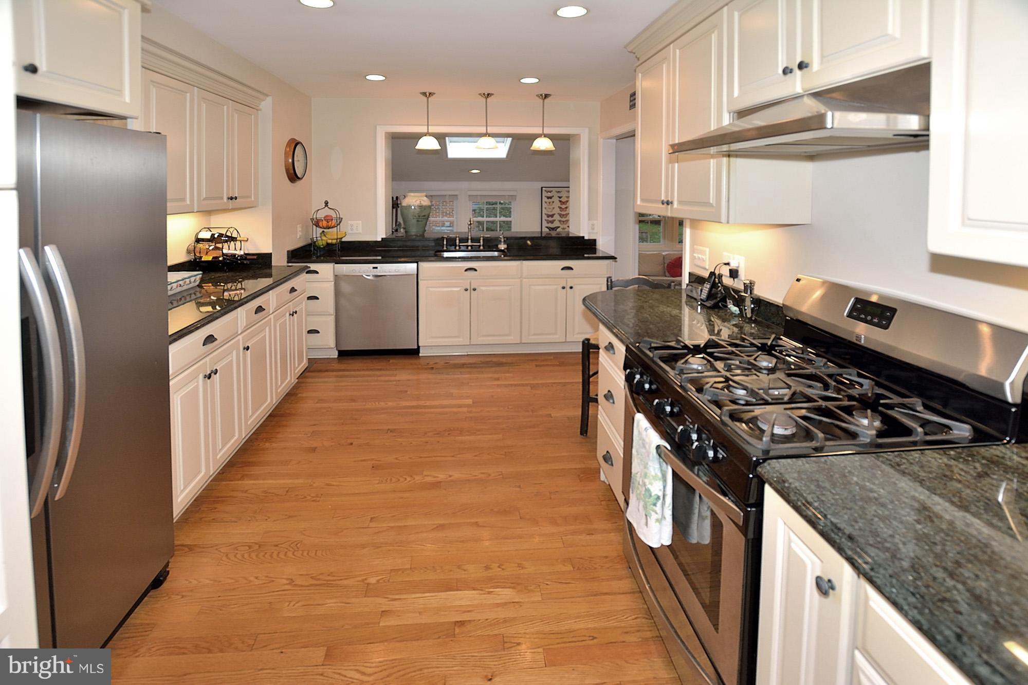 Remodeled Kitchen with Granite and SS Appliances